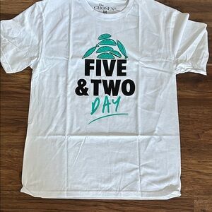 White unisex Chosen Tshirt new in package. Med. White/ turquoise.